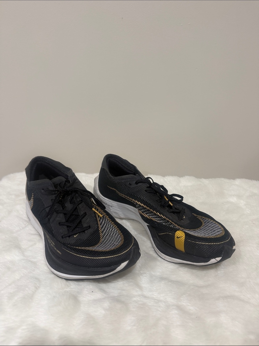 Nike Women’s Black and Gold Performance Running Shoes